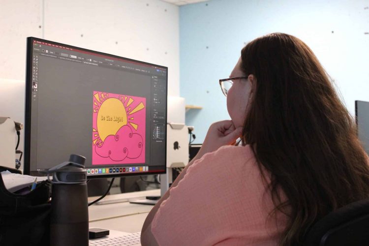 Hailey-Lynn creating her design