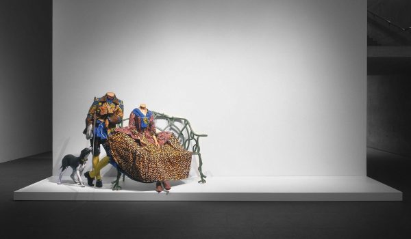 Yinka Shonibare CBE, RA Mr. and Mrs. Andrews without their Heads, 1998, two life-size mannequins, bench, gun, dog, Dutch wax printed cotton, , 165 x 635 x 254 cm. National Gallery of Canada, Ottawa. © Yinka Shonibare CBE. All Rights Reserved DACS/Artimage 2022. Photo: NGC