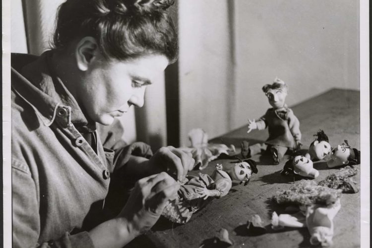 Alma Duncan working on puppets for Folksong Fantasy, c. 1950, photograph. Library and Archives Canada, e011872115.